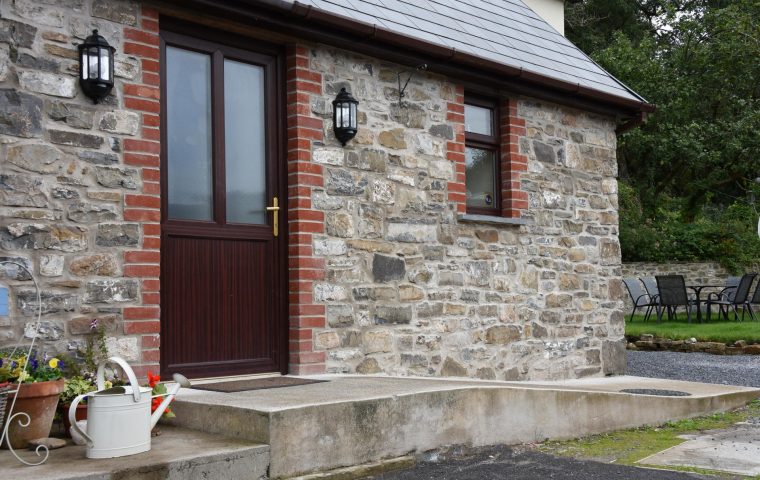 Front door and brickwork of accommodation for west wales holidays